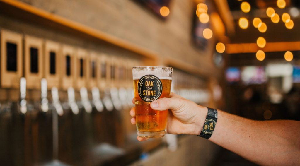 man holding beer