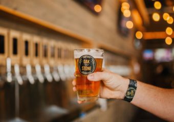 man holding beer